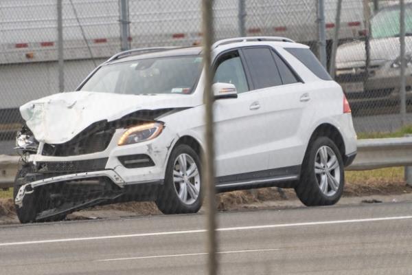 The driver of the Mercedes fled the scene on foot. (Theodore Parisienne for New York Daily News)