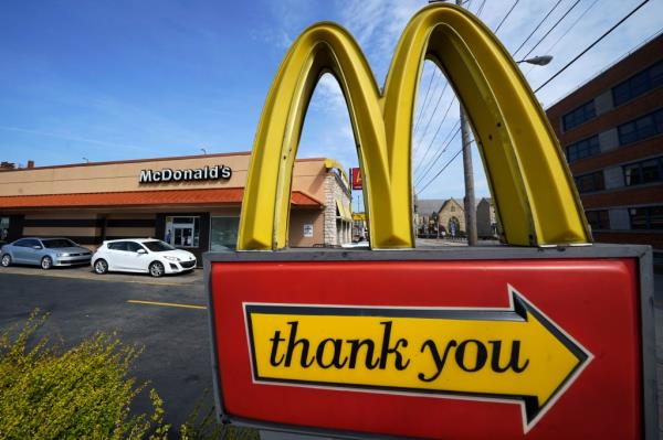 Sign in front of a McDonald's restaurant in Pittsburgh with a large letter on it, taken on April 23, 2022.